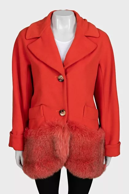 Orange coat decorated with fur