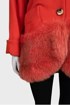 Orange coat decorated with fur
