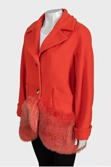 Orange coat decorated with fur