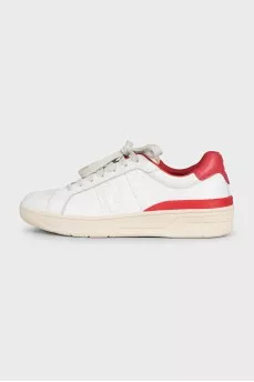 White leather sneakers with tag
