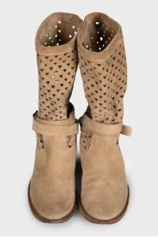 Suede boots with figured perforations