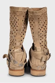 Suede boots with figured perforations
