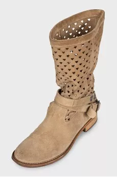 Suede boots with figured perforations
