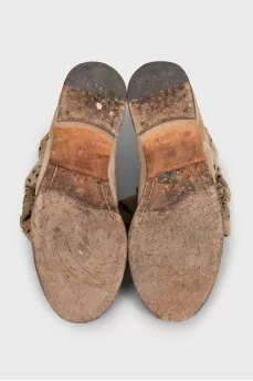 Suede boots with figured perforations