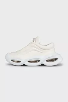 White textile sneakers with a shaped sole