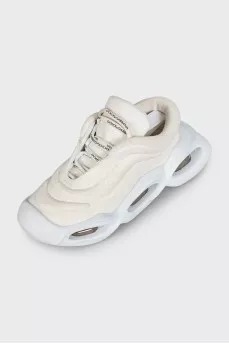 White textile sneakers with a shaped sole