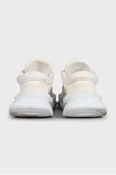 White textile sneakers with a shaped sole
