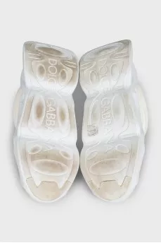 White textile sneakers with a shaped sole