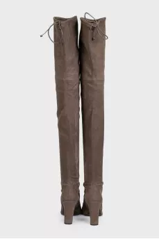 Brown suede over-the-knee boots with laces