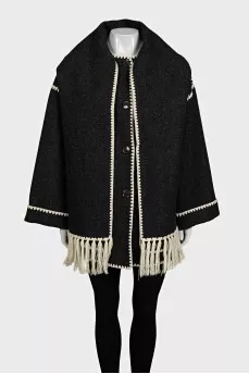 Straight-cut coat decorated with fringe