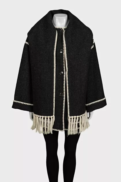 Straight-cut coat decorated with fringe