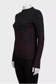 Purple jumper with a lightning print