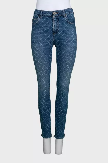 Blue skinny fit jeans with a print