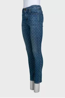 Blue skinny fit jeans with a print