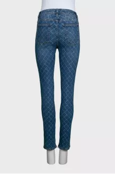 Blue skinny fit jeans with a print