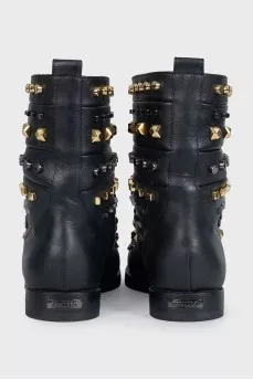 Leather boots with metallic decor and crystals