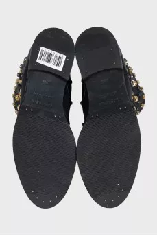 Leather boots with metallic decor and crystals