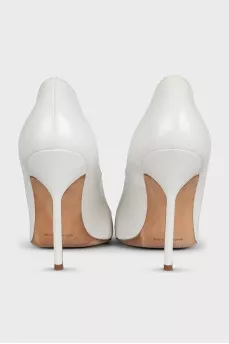 White stiletto pumps