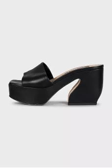 Black leather mules with a shaped heel
