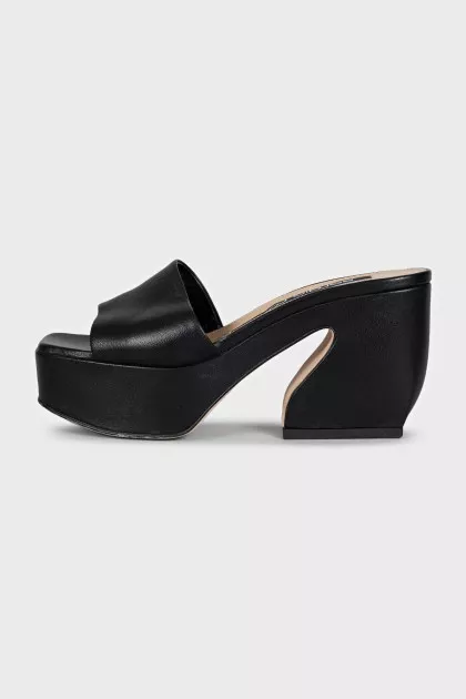 Black leather mules with a shaped heel