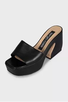Black leather mules with a shaped heel
