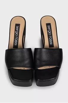 Black leather mules with a shaped heel