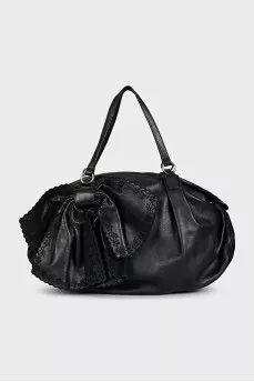 Black leather bag with a bow