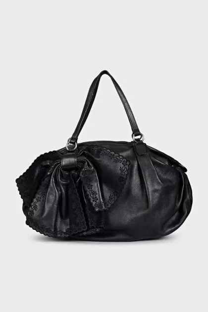 Black leather bag with a bow