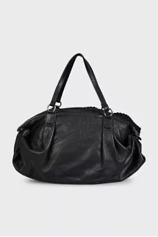Black leather bag with a bow
