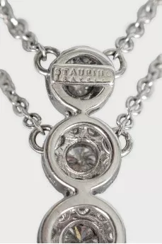 White gold necklace with a decorated pendant