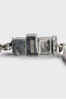 White gold necklace with a decorated pendant