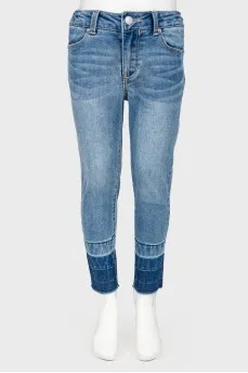 Children's jeans with the effect of torn below