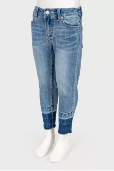 Children's jeans with the effect of torn below