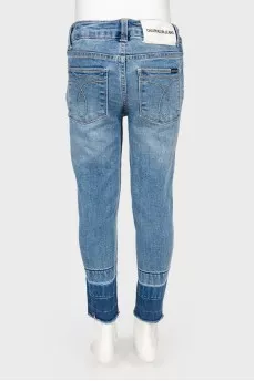 Children's jeans with the effect of torn below