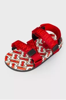 Children's red sandals with a tag