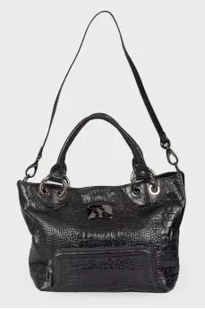 Leather bag with embossing for reptile