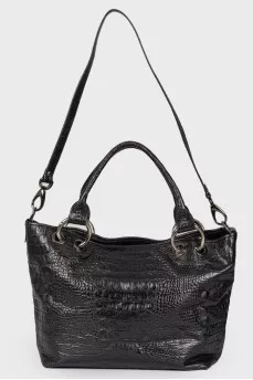 Leather bag with embossing for reptile
