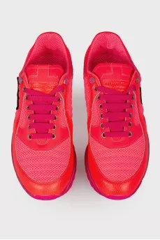 Bright pink sneakers