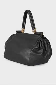 Leather bag, voluminous on the sides