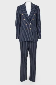 Striped suit with golden buttons