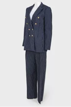 Striped suit with golden buttons