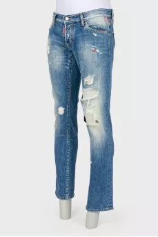 Male jeans with the effect of torn and shabby
