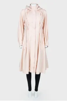 Pale pink trench coat