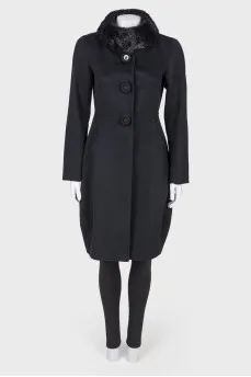 Black coat with a fur collar