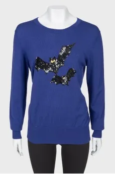 Sweater with sequin appliqué
