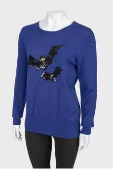 Sweater with sequin appliqué