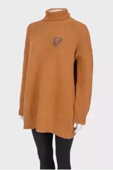 Oversized sweater with appliqué