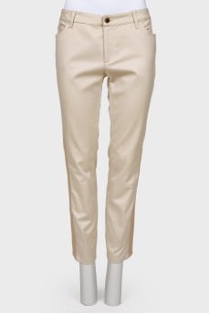 Beige trousers with stripes