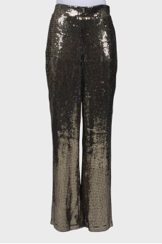 Trousers decorated with sequins