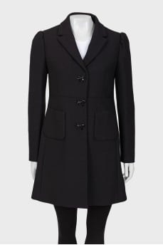 Coat decorated with bows